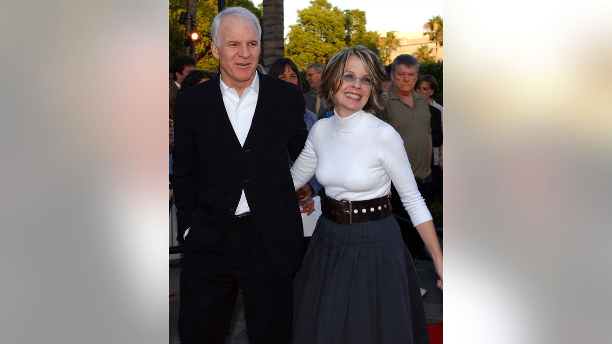 Diane Keaton and Steve Martin are pictured smiling in 2001. 