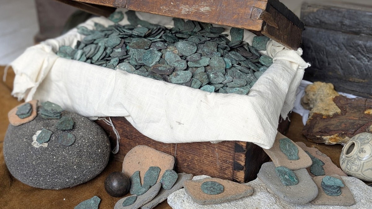 wooden case of gold silver coins from shipwreck