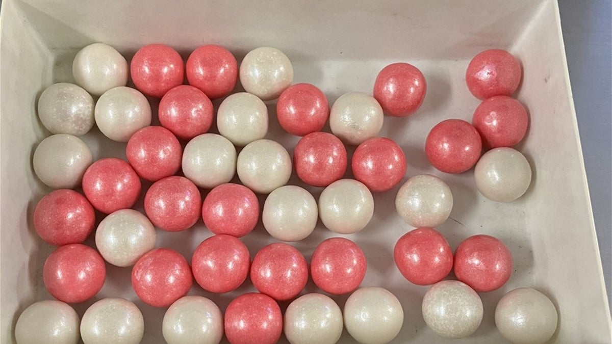 Halloween candy safety alert as authorities find THC-infused treats 1 A bowl of pink and white gumball-style candies made with Fentanyl