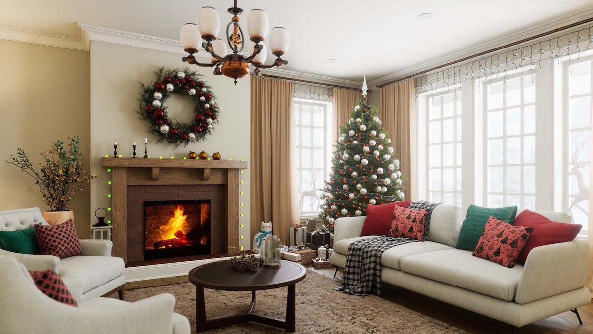 A warm living room decorated for the holidays, featuring a festive Christmas tree and a cozy fireplace