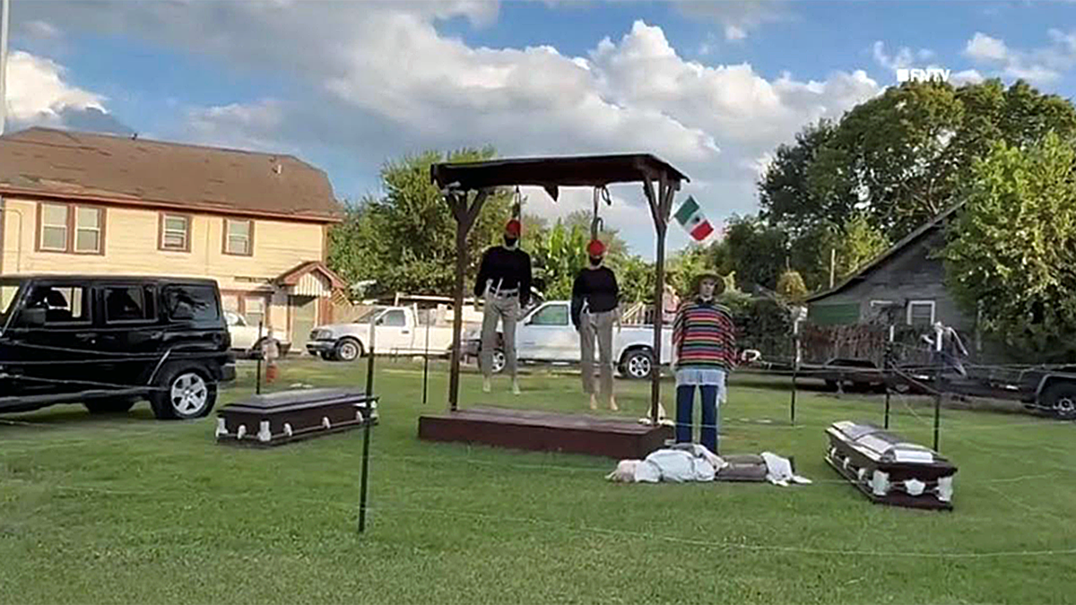 Halloween display showing hanging of effigies of ICE agents in Houston, Texas