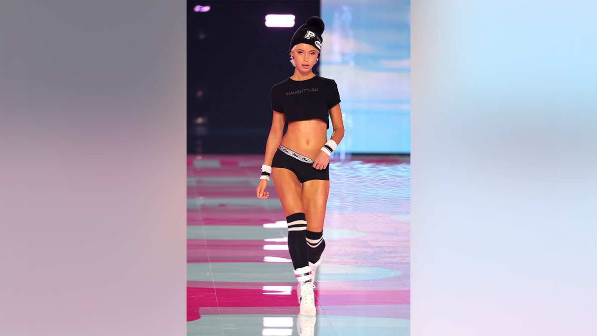 Iris Law walked the runway at the Victoria's Secret Fashion Show in a black set.