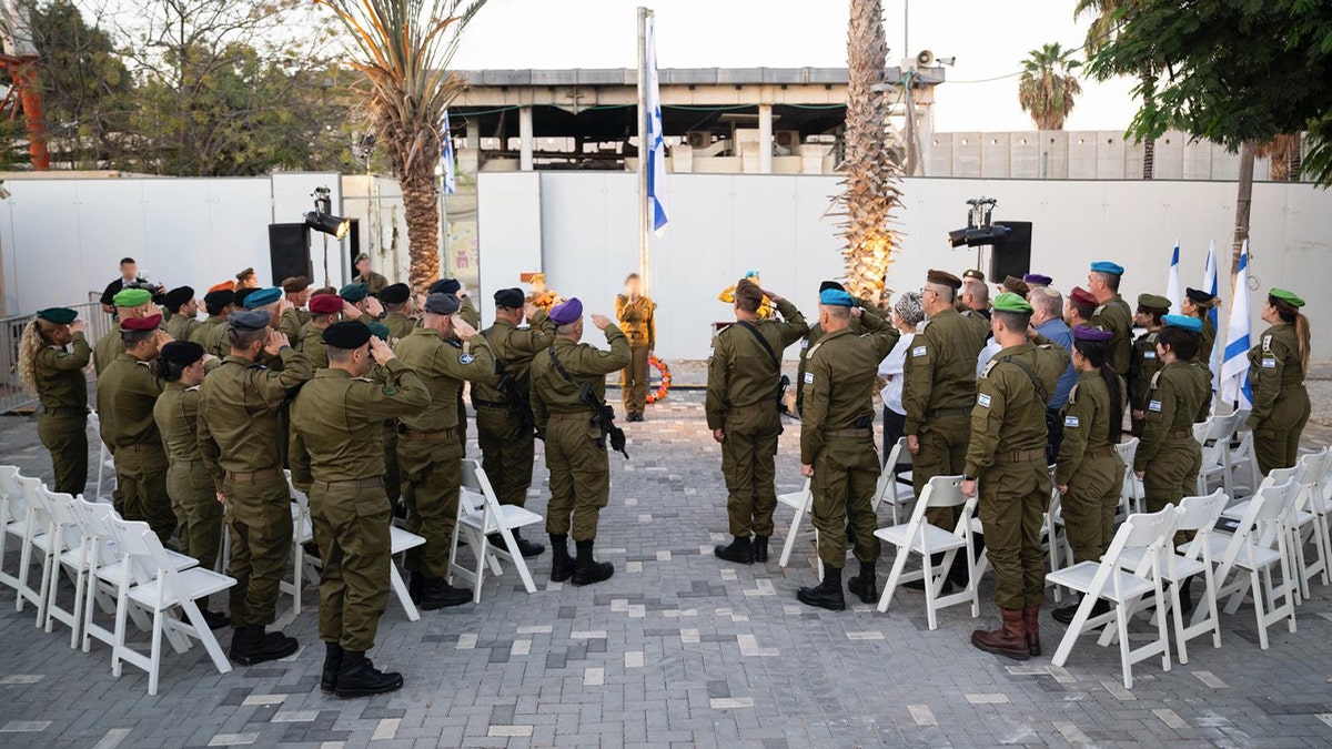 Israeli soldiers saluting