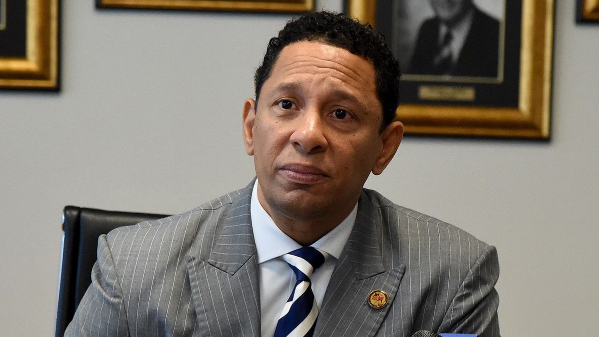 Baltimore City State's Attorney Ivan Bates sitting in his office