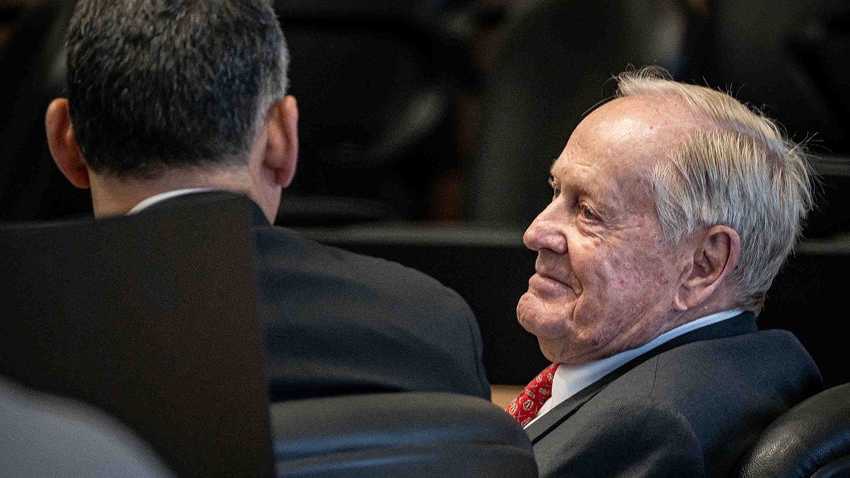 Jack Nicklaus smiling in courtroom