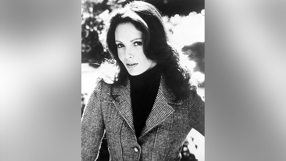 A black and white photo of Jaclyn Smith taken in the 1970s.
