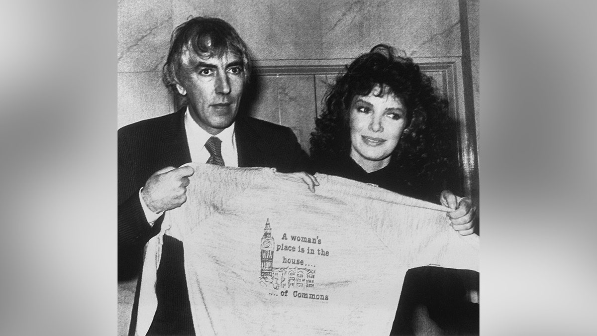 Jaclyn Smith with Peter Cook in England in January 1984 at a luncheon for the 300 Group.