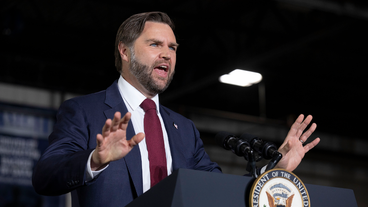 JD Vance speaks on stage