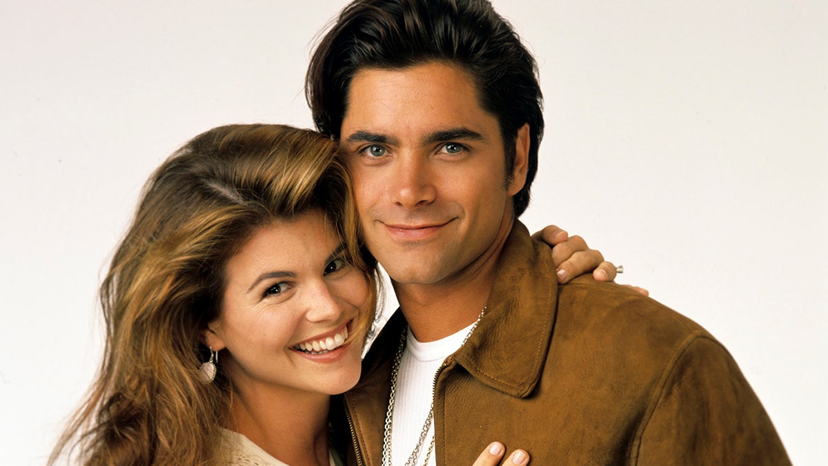 John Stamos and Lori LOughlin in a Full House promo