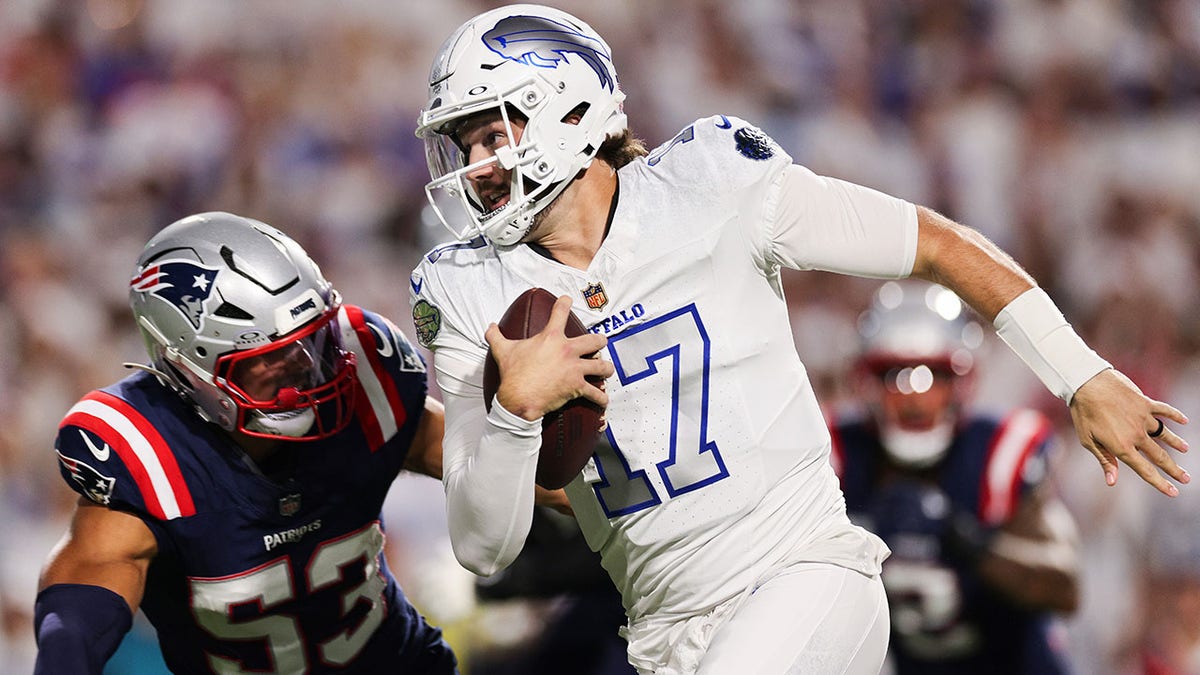 Josh Allen runs out on field