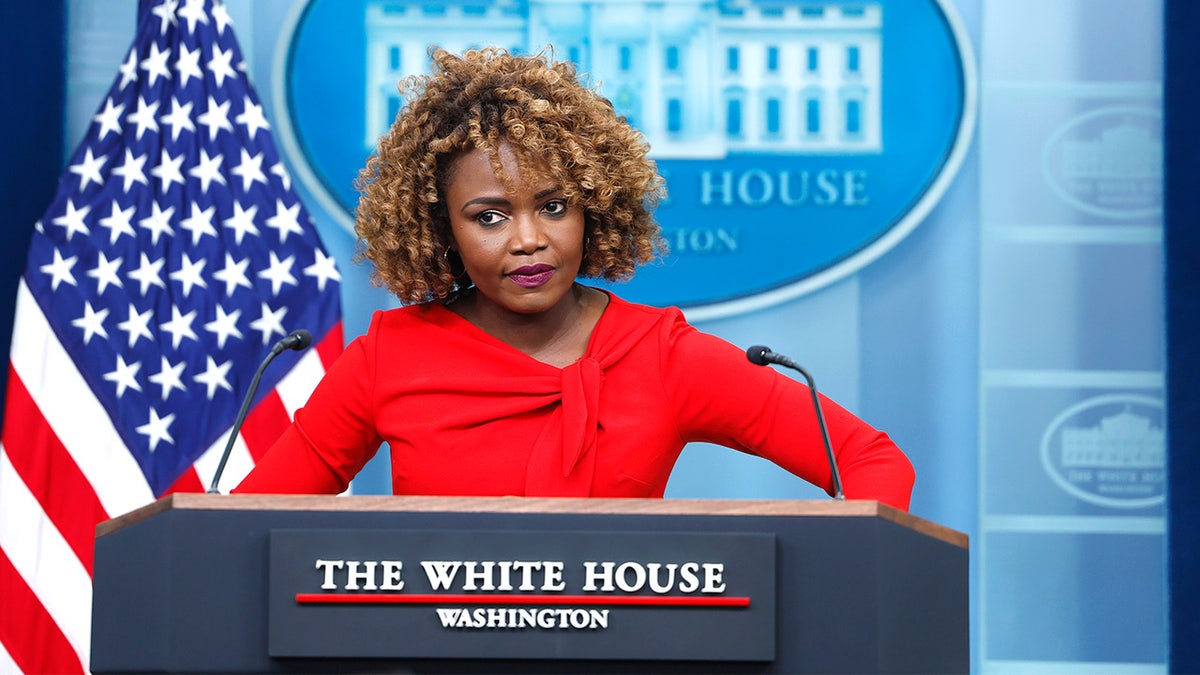 Former White House press secretary Karine Jean-Pierre speaks from the podium during a press briefing.