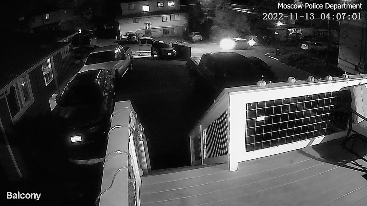 black and white image from surveillance video shows Bryan Kohberger's white Elantra near the Idaho student murders crime scene