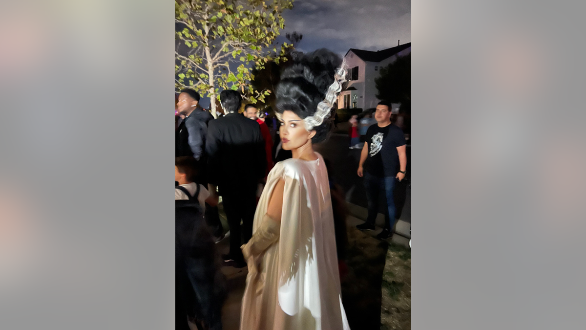 Kourtney Kardashian dressed as the Bride of Frankenstein for Halloween 2025