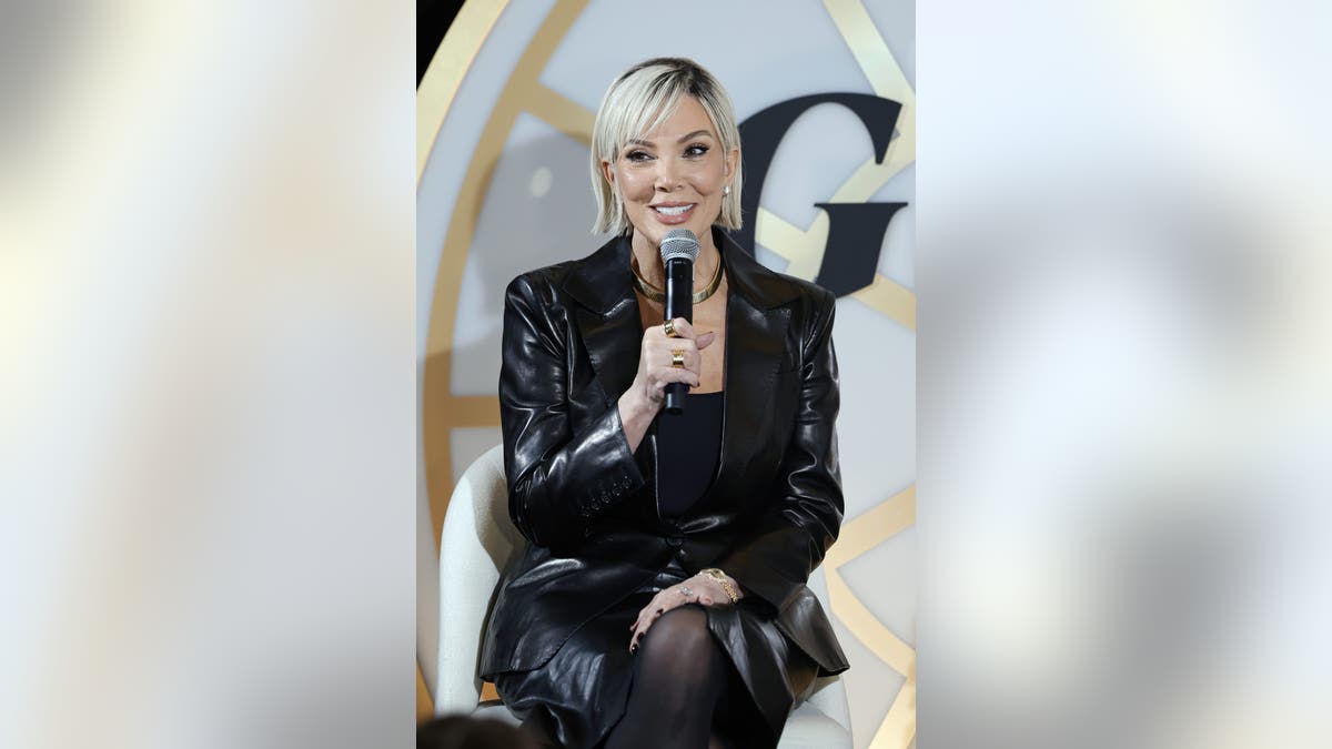 Kris Jenner smiling with blonde hair