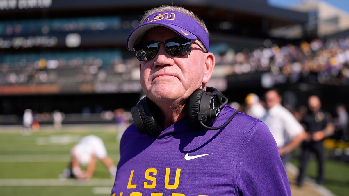 Brian Kelly stares off into space