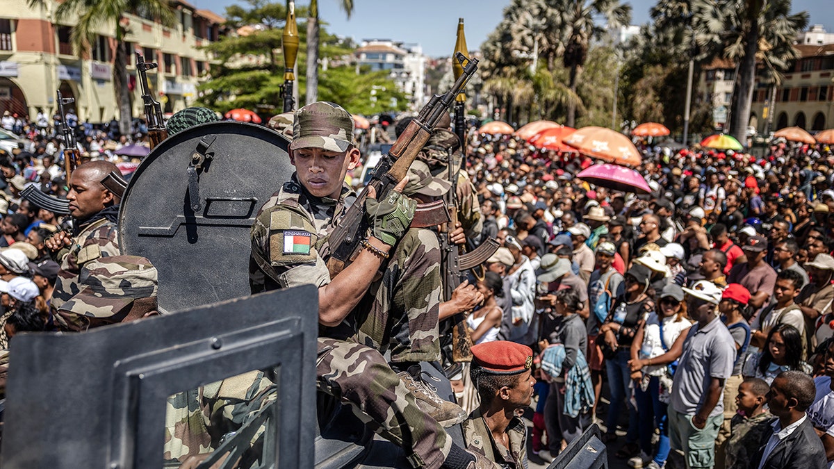 Members of Madagascar's CAPSAT military unit surrounded by crowds