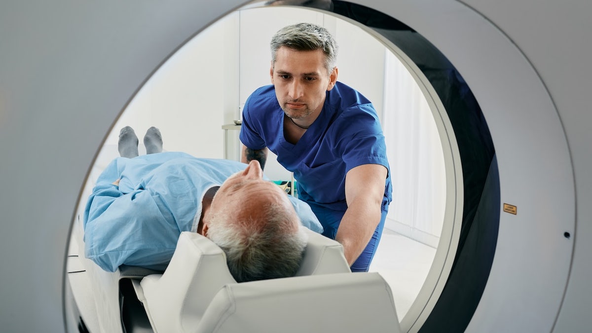 Man going in for CT scan