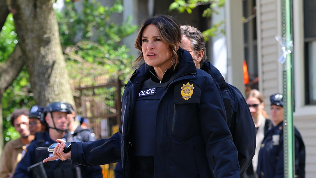 Mariska Hargitay wears a police uniform while filming a scene for "SVU."