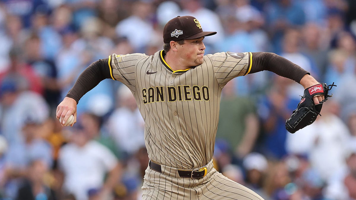 Mason Miller pitches