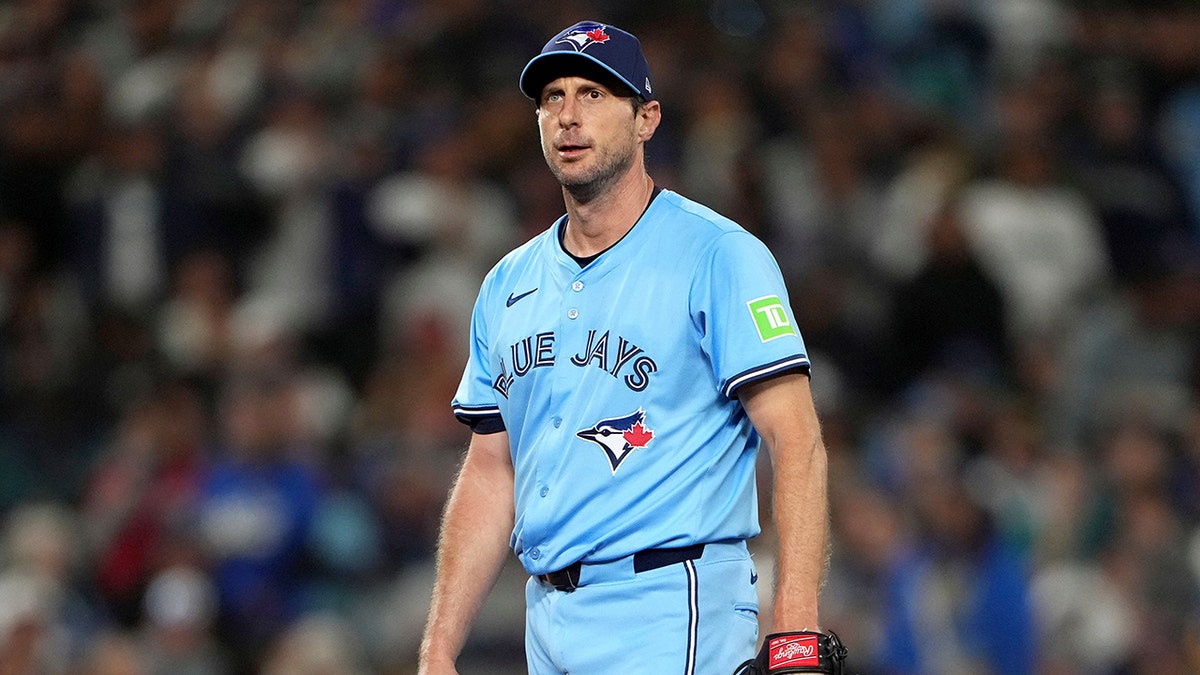 Max Scherzer looks on