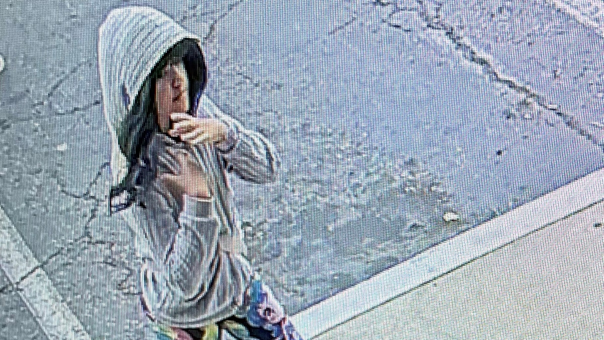 Surveillance image of missing Melodee Buzzard walking