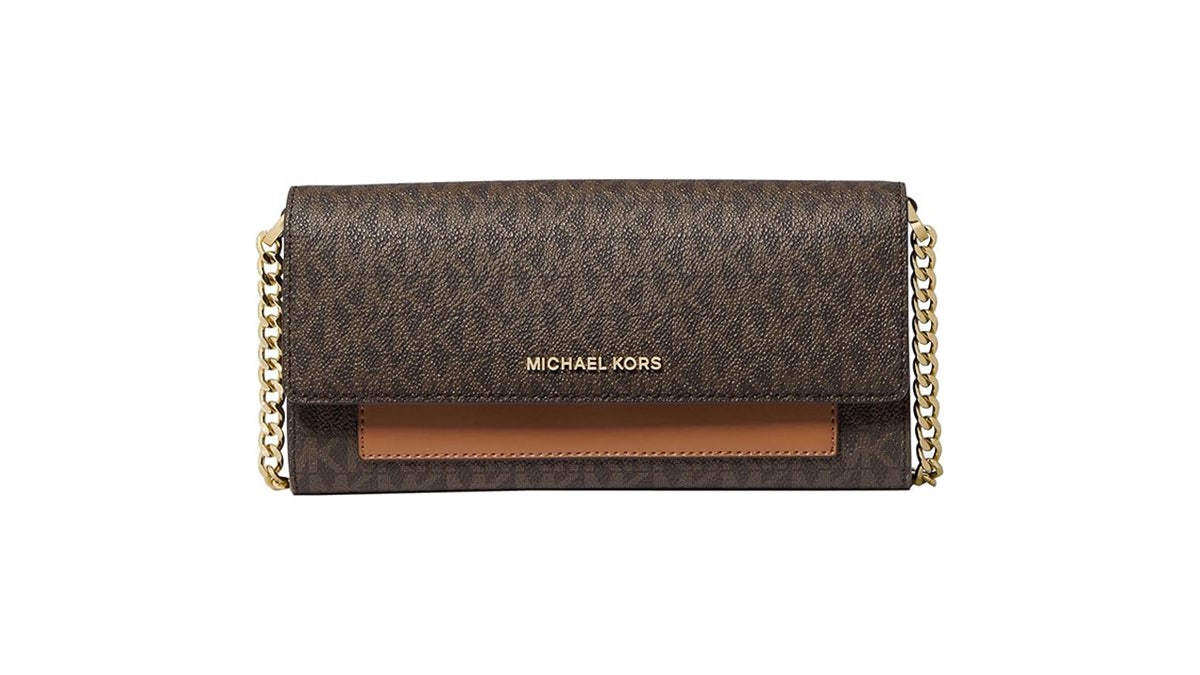 This versatile bag can be worn across the body or used as a wallet.