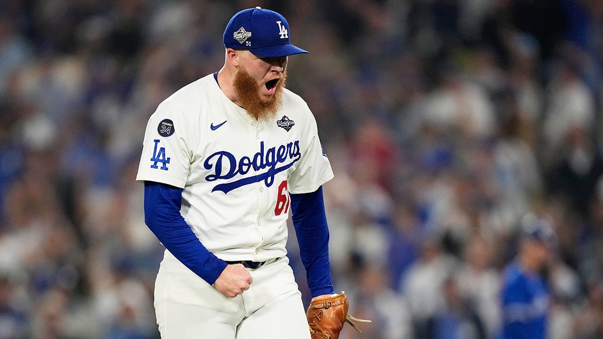Los Angeles Dodgers pitcher Will Klein celebrating during a baseball game.
