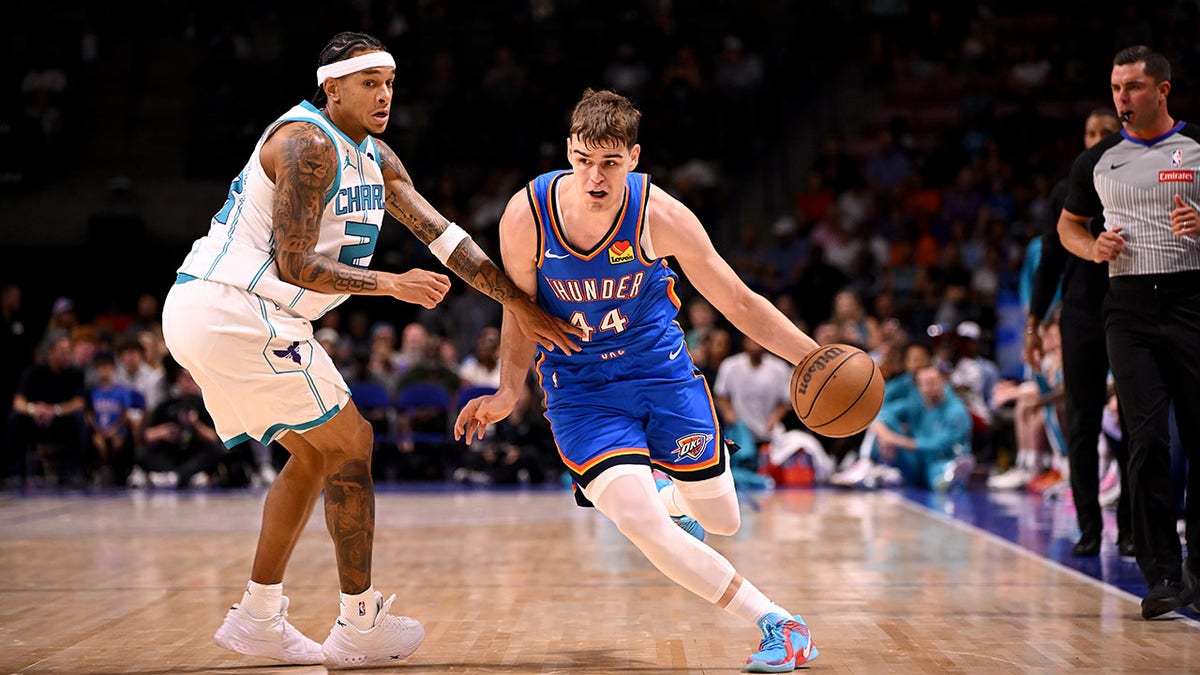 Nikola Topic drives up the court