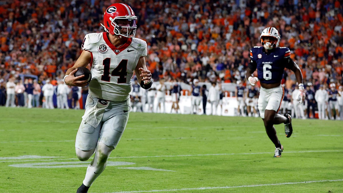 Gunner Stockton runs for a touchdown