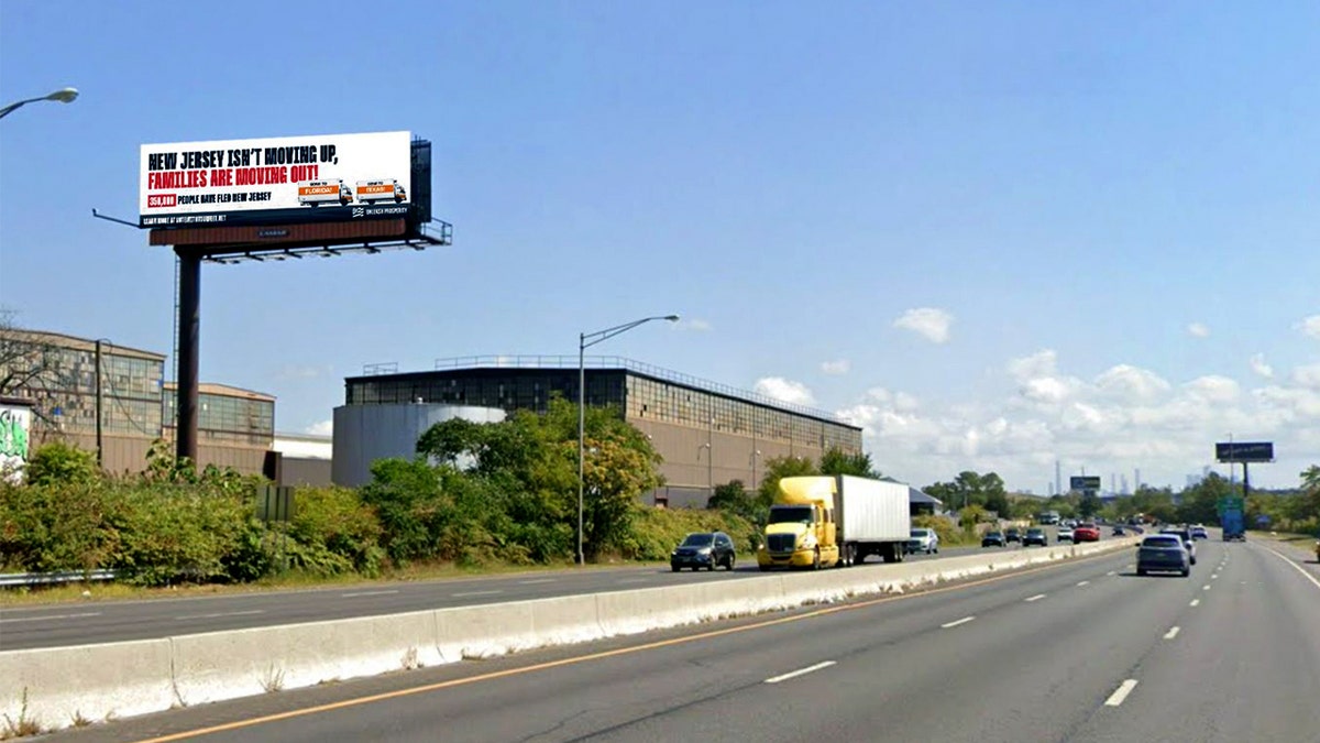Billboard reads "New Jersey isn't moving up, families are moving out!"