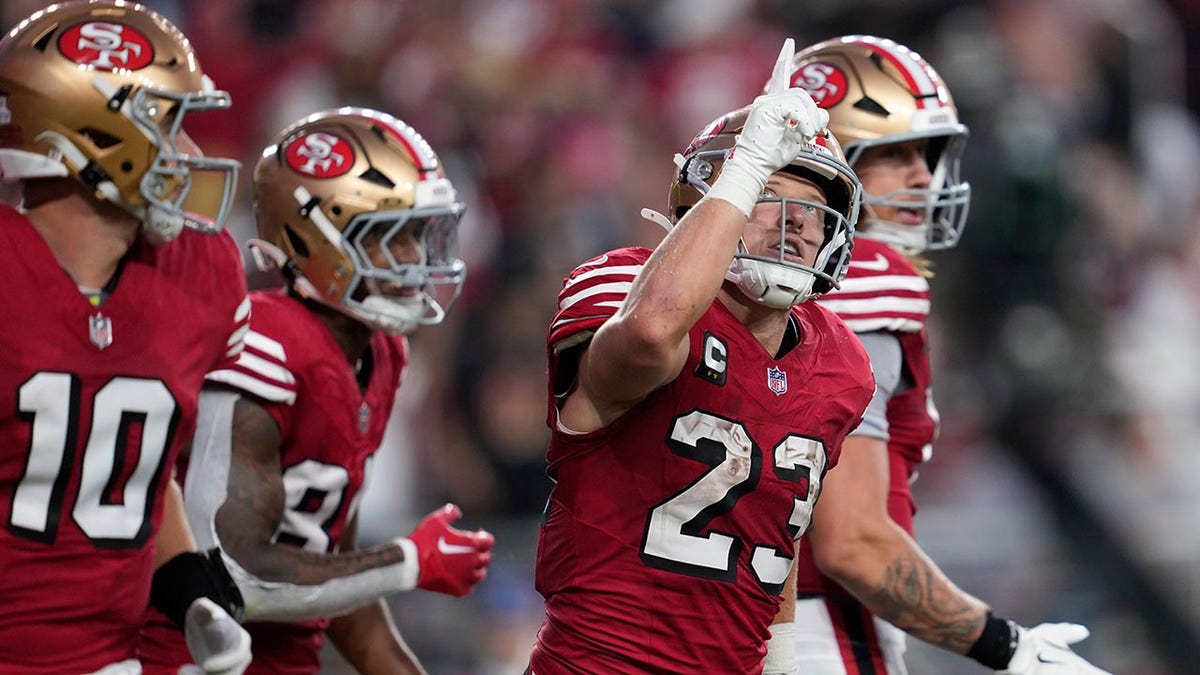 Christian McCaffrey celebrates a touchdown