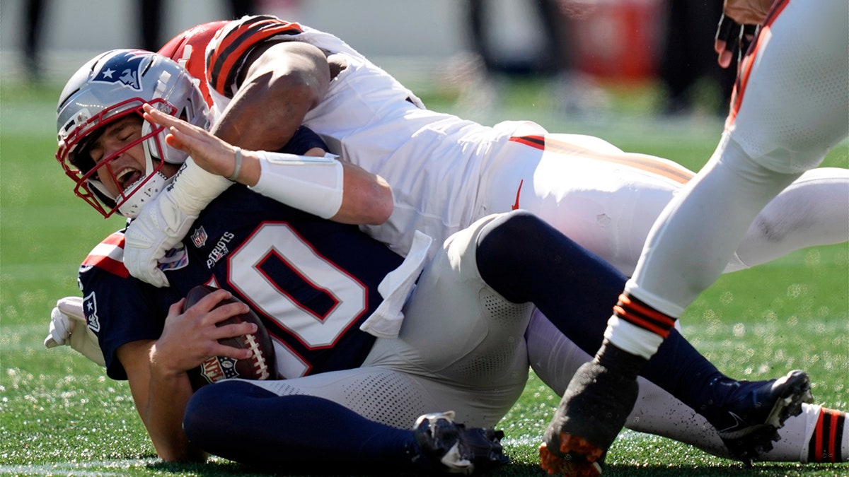 Drake Maye is sacked by Myles Garrett