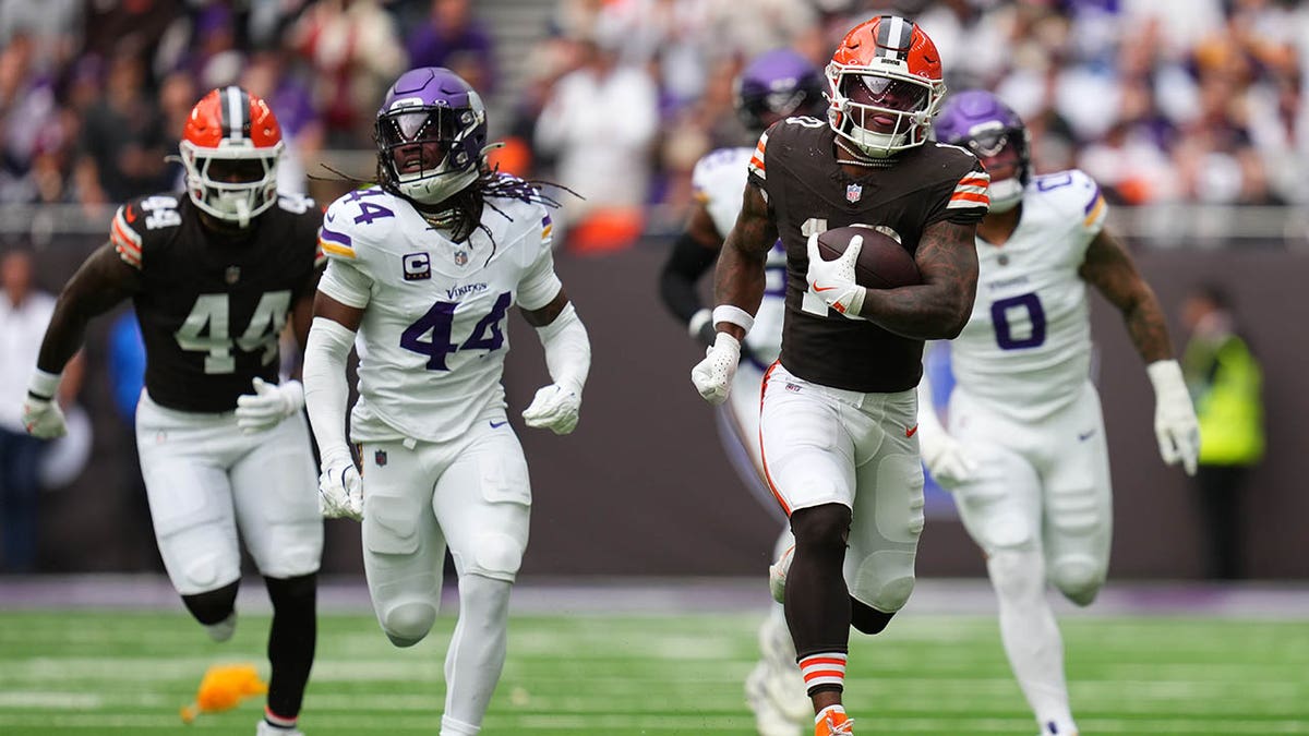 Quinshon Judkins runs down the field