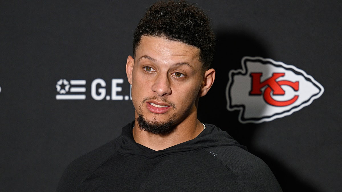 Patrick Mahomes talks to reporters