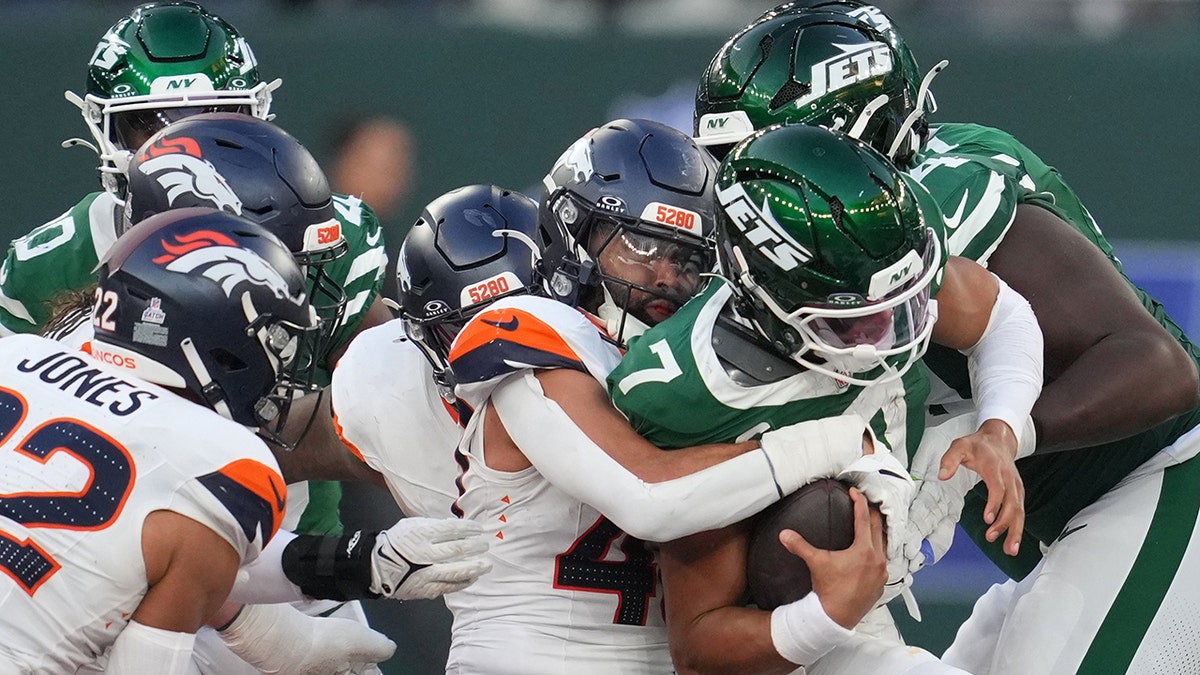 Justin Fields gets tackled