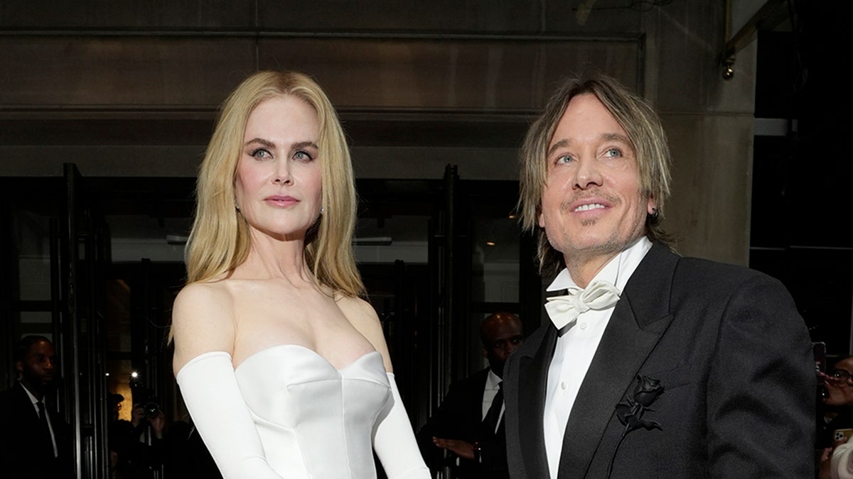 Nicole Kidman and Keith Urban are dressed in elegant, coordinated looks as they depart for the 2024 Met Gala.