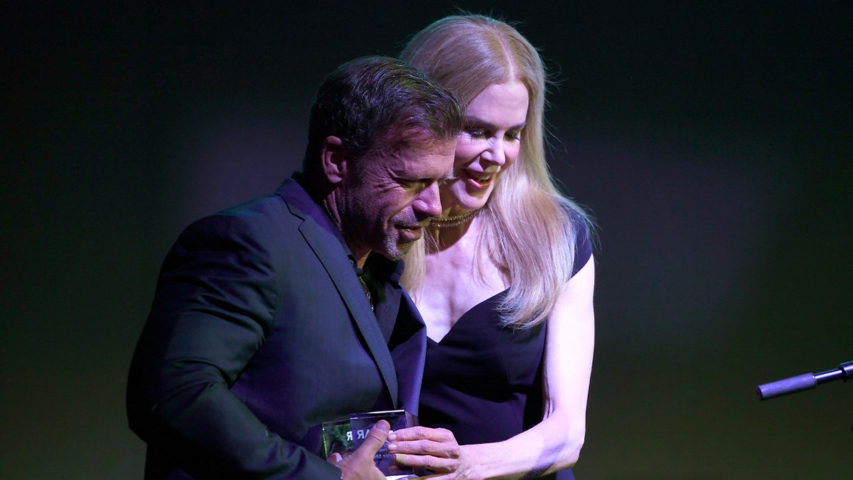 Taylor Sheridan laughs next to Nicole Kidman