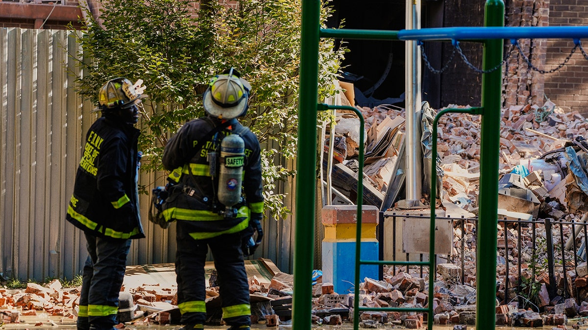 Firefighters at scene of building collapse in NYC
