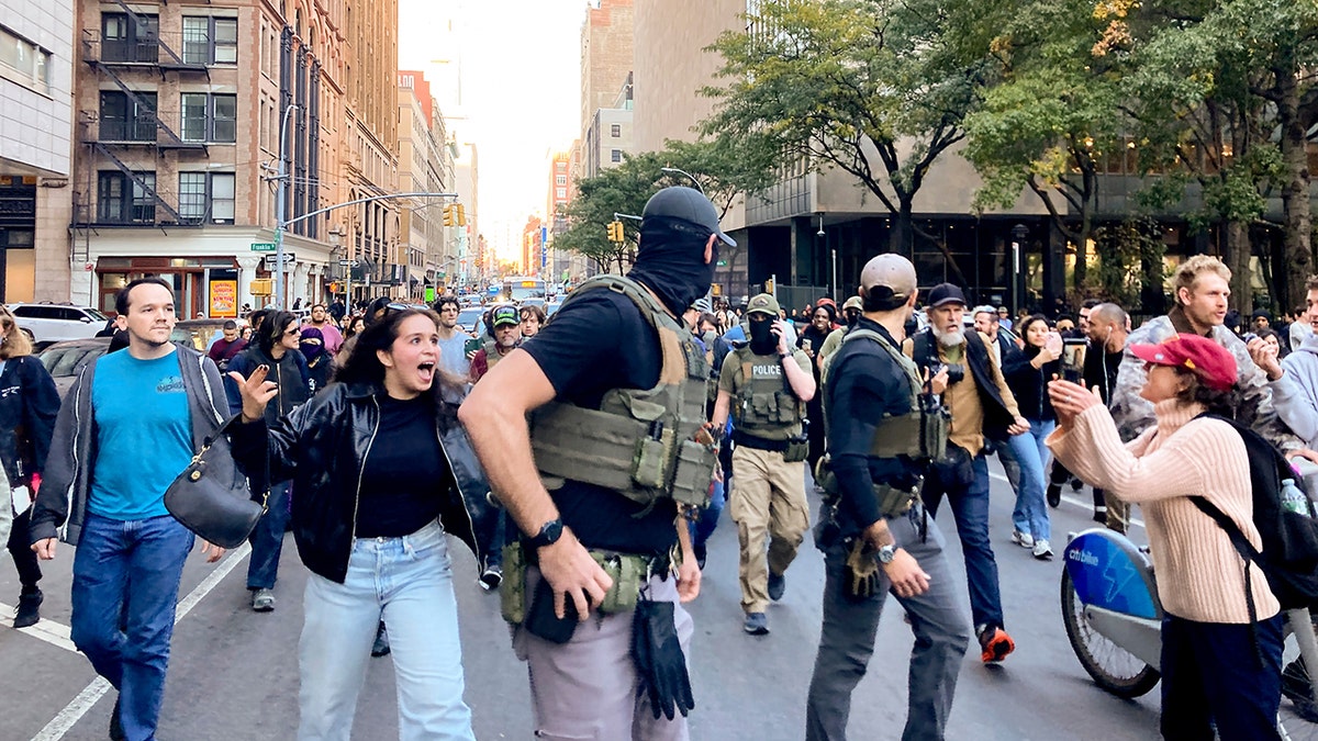 Protester shouts at federal agent in NYC