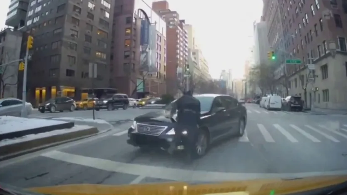 Video shows NYPD officer struck by car