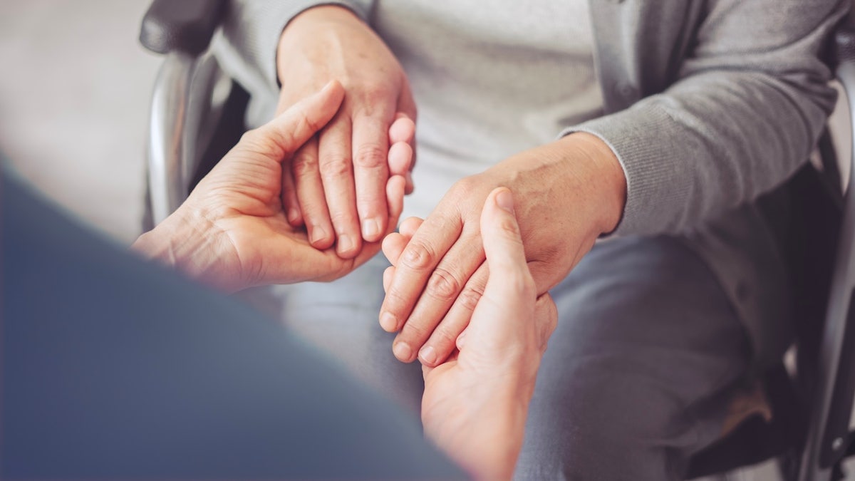 Older woman with Parkinson's