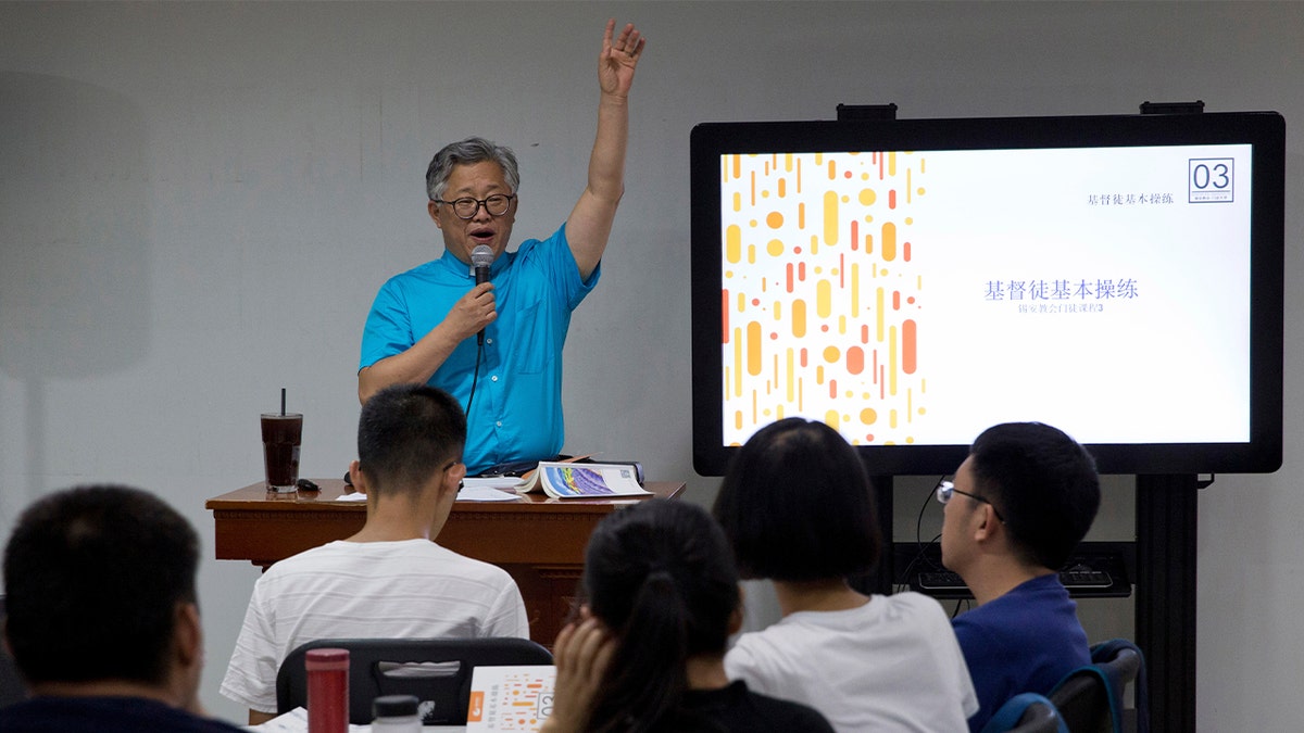 Pastor Jin teaches a class in 2018