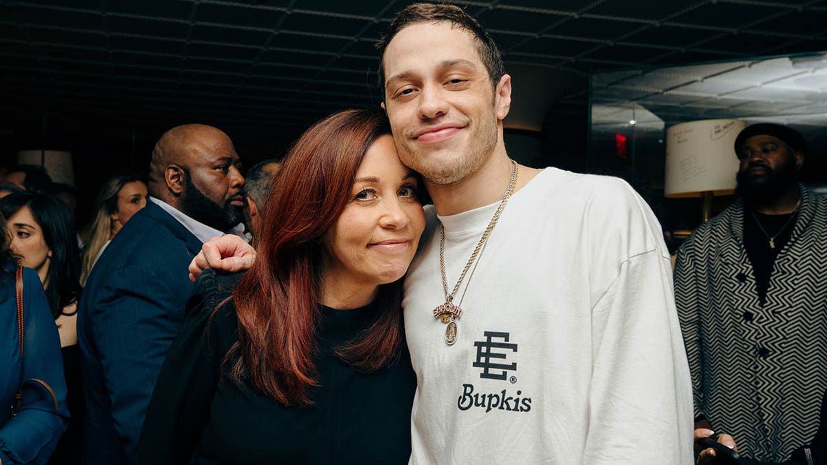 Pete Davidson and his mom Amy at the Bupkis premiere party. 