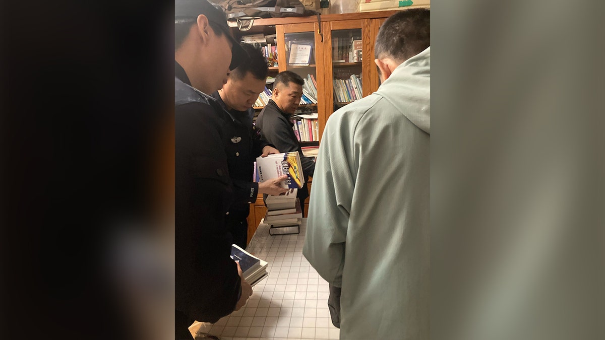 Chinese police raid the home of a pastor