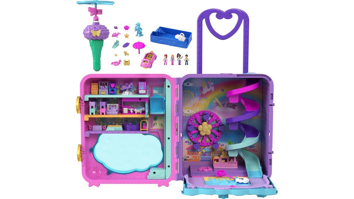 Polly Pocket Pollyville Resort Roll Away opens up to reveal a massive three-story resort.