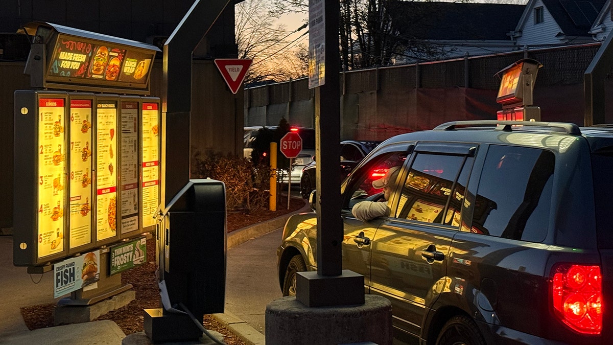 Man seen in car ordering at Wendy's drive-thru in Queens, New York.