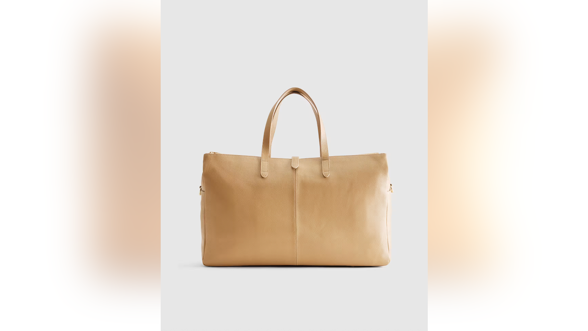 Made from 100% leather, this bag is the perfect blend of style and function.