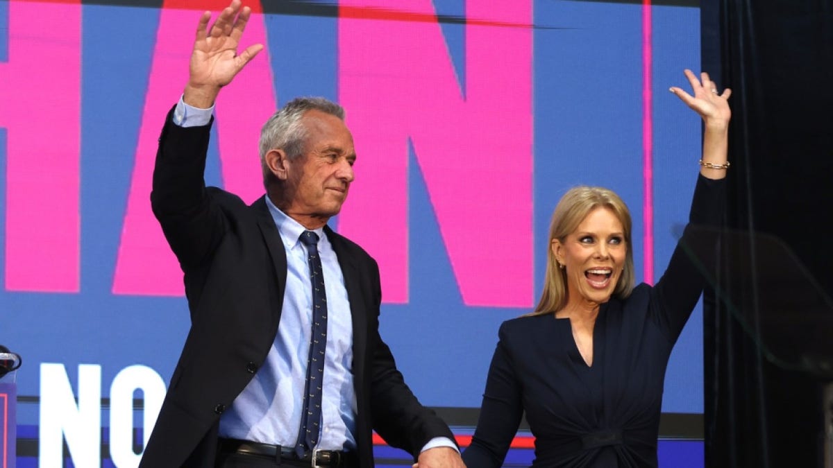Robert F. Kennedy, Jr. and Cheryl Hines greet supporters.