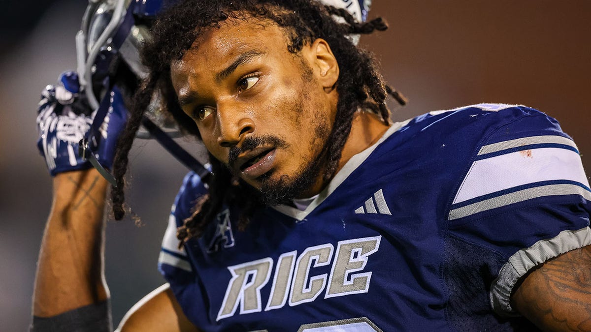 Khary Crump removes his helmet
