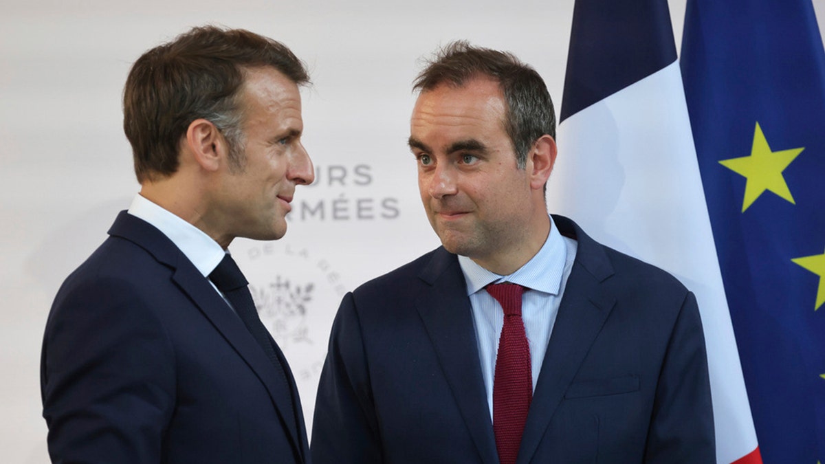 Sebastien Lecornu speaks with emmanuel macron